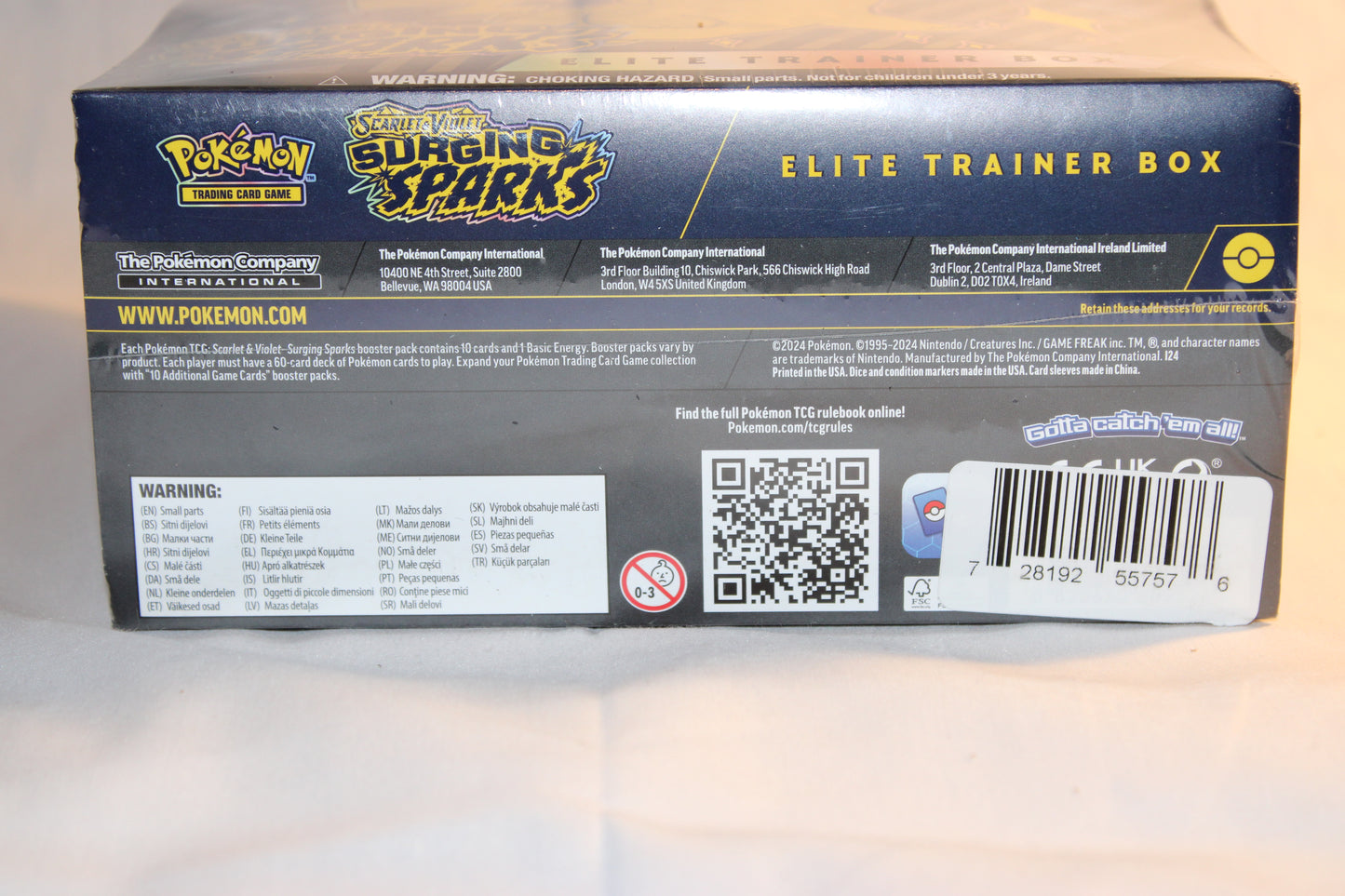 Pokémon Trading Card Game Elite Trainer Box packaging with branding and product details.